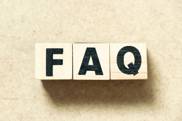 FAQ spelled using wooden letter chips depicting questions about furnace short-cycling