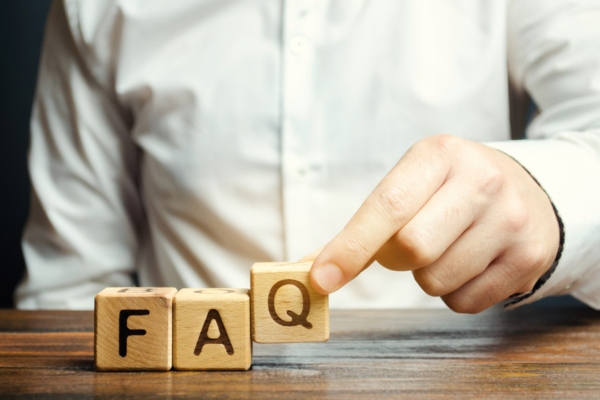 FAQ letters on wooden blocks for ductless AC FAQs