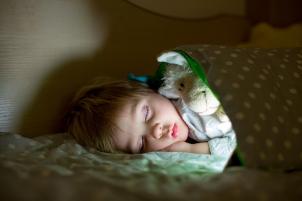 toddler sleeping soundly depicting low noise of whole house generator