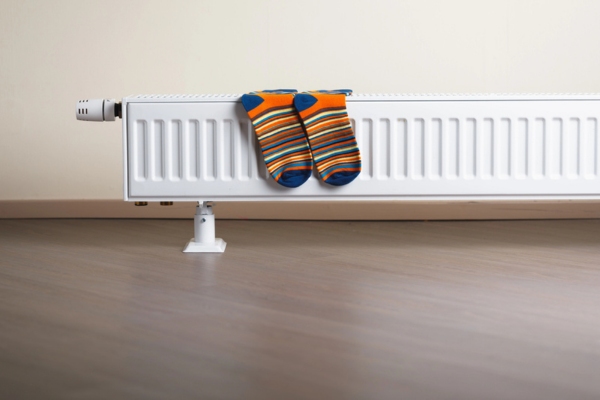 home radiator with socks hung to dry